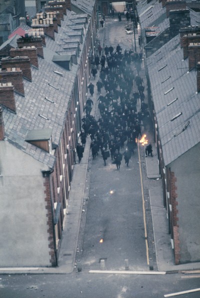 Troops of the Royal Ulster Constabulary enter the Catholic neighbourhood called Bogside in the Battle of the Bogside.Belfast, Northern Ireland ca. 1969 Derry/Londonderry, Northern Ireland August (1969) by Akihiko Okamura